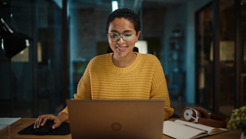 woman-sitting-at-computer-working